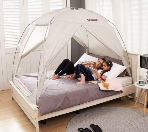 camping at home in a bed tent