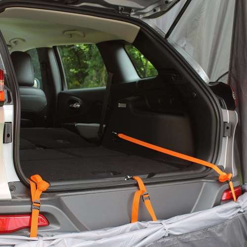 suv tent strapped into cargo area of suv