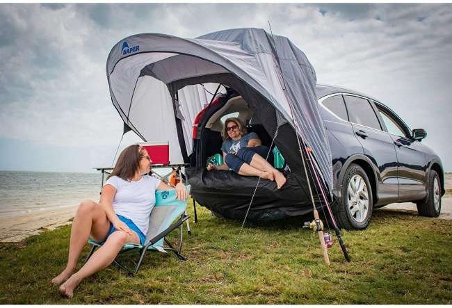 2 women relaxing under napier cove tent