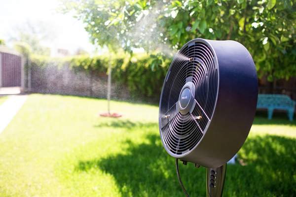 outdoor misting fan in a garden