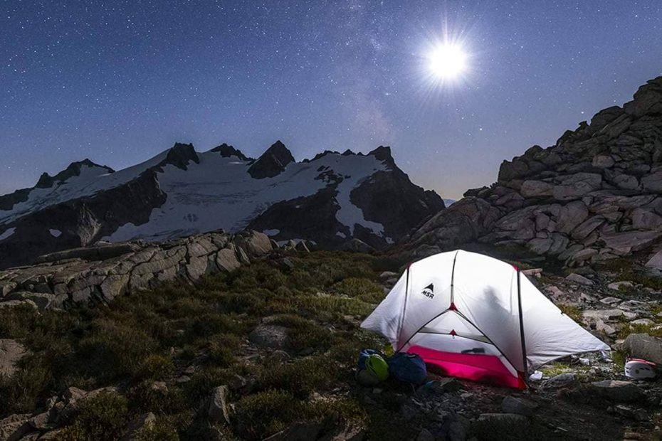 A pitched MSR tent at night under a beautiful moon